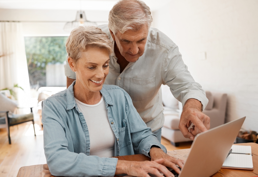 Retirement,,Senior,Couple,And,Ecommerce,On,Laptop,For,Home,Purchase
