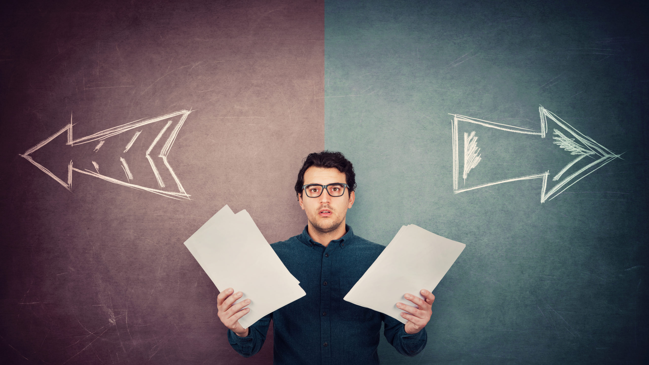 Perplexed,Businessman,Has,To,Choose,As,Holds,Different,Paper,Documents